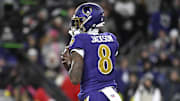 Nov 27, 2025; Baltimore, Maryland, USA; Baltimore Ravens quarterback Lamar Jackson (8) drops back to pass against the Cincinnati Bengals during the first half at M&T Bank Stadium. Mandatory Credit: Tommy Gilligan-Imagn Images