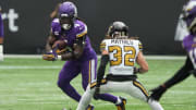 Oct 2, 2022; Minnesota Vikings running back Dalvin Cook (4) runs against New Orleans Saints safety Tyrann Mathieu (32)