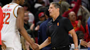 USC coach Eric Musselman shakes hands with Maryland players after a Trojans loss. 