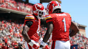 Aug 30, 2025; College Park, Maryland, USA; Maryland Terrapins wide receiver Shaleak Knotts (4) celebrates with Maryland Terrapins wide receiver Jalil Farooq (1) after scoring a touchdown during the first half against the Florida Atlantic Owls at SECU Stadium. Mandatory Credit: Daniel Kucin Jr.-Imagn Images