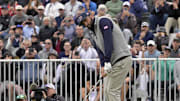 Sep 28, 2024; Ile Bizard, Quebec, CAN; Scottie Scheffler of team U.S.A. hits a chip shot on the third hole during the third round of The Presidents Cup golf tournament. Mandatory Credit: Eric Bolte-Imagn Images