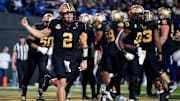 Vanderbilt quarterback Diego Pavia (2) celebrates after wide receiver Richie Hoskins scoring a touchdown against Kentucky during the third quarter at FirstBank Stadium in Nashville, Tenn., Saturday, Nov. 22, 2025.