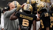 Vanderbilt coach Clark Lea congratulates wide receiver Tre Richardson (6) on his touchdown against Kentucky during the second quarter at FirstBank Stadium in Nashville, Tenn., Saturday, Nov. 22, 2025.