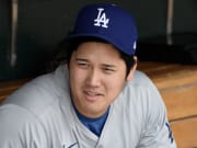 Jul 14, 2024; Detroit, Michigan, USA;  Los Angeles Dodgers designated hitter Shohei Ohtani (17) talks with teammates in the dugout before their game against the Detroit Tigers at Comerica Park.