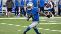 Former Detroit Lions wide receiver DJ Chark (4) runs with the ball during the 2022 season.