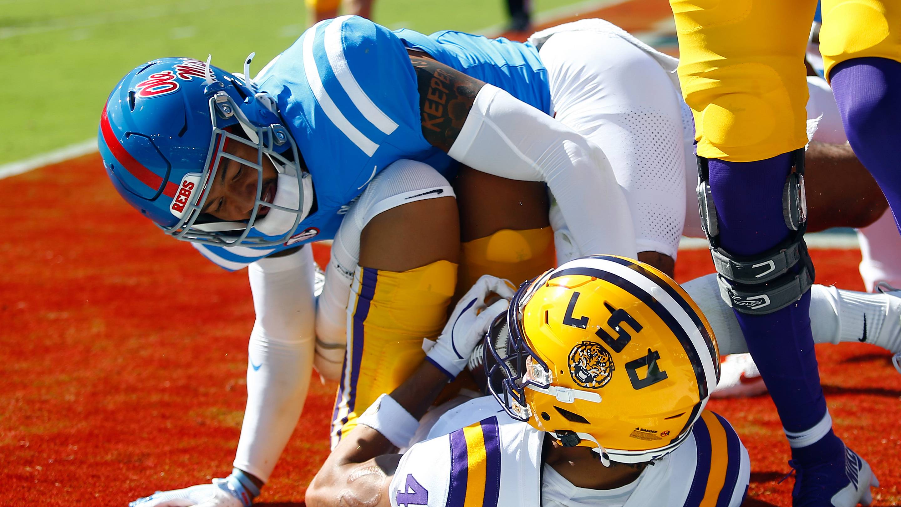 Sep 27, 2025; Oxford, Mississippi, USA; LSU Tigers wide receiver Nic Anderson (4) catches the ball for a touchdown during the first quarter against the Mississippi Rebels at Vaught-Hemingway Stadium. Mandatory Credit: Petre Thomas-Imagn Images