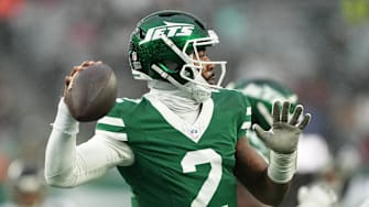 Nov 30, 2025; East Rutherford, New Jersey, USA; New York Jets quarterback Tyrod Taylor (2) drops back to pass against the Atlanta Falcons during the first half at MetLife Stadium. Mandatory Credit: Robert Deutsch-Imagn Images