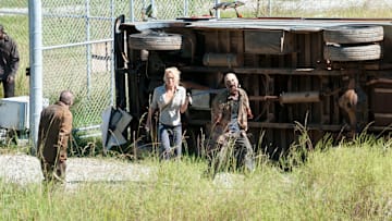 Andrea (Laurie Holden) and Walkers - The Walking Dead_Season 3, Episode 11_"I Ain't a Judas" - Photo Credit: Gene Page/AMC