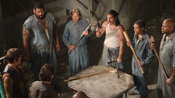 (Clock wise from the bottom) T-Dog (Robert 'IronE' Singleton), Rick Grimes (Andrew Lincoln), Daryl Dixon (Norman Reedus), Big Tiny (Theodus Crane), Axel (Lew Temple), Tomas (Nick Gomez), Andrew (Markice Moore), and Oscar (Vincent Ward) - The Walking Dead season 3