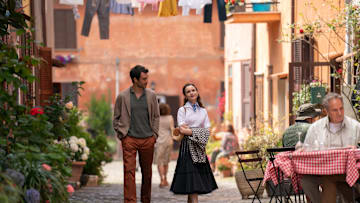 Emily in Paris. (L to R) Eugenio Franceschini as Marcello, Lily Collins as Emily in episode 410 of Emily in Paris. Cr. Giulia Parmigiani/Netflix © 2024