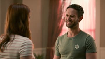 Sweet Magnolias. (L to R) JoAnna Garcia Swisher as Maddie, Hunter Burke as Trotter in episode 308 of Sweet Magnolias. Cr. Courtesy of Netflix © 2023