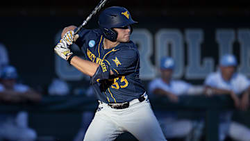 Jun 7, 2024; Chapel Hill, NC, USA; West Virginia Mountaineers Logan Sauve (33) bats against the North Carolina Tar Heels in the fifth inning during the DI Baseball Super Regional at Boshamer Stadium.  Mandatory Credit: Jeffrey Camarati-Imagn Images