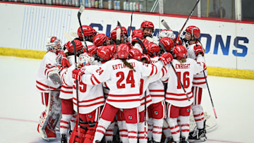 Wisconsin players celebrate after their 4-1 victory over Clarkson in an NCAA regional final March 15, 2025, at LaBahn Arena in Madison, Wisconsin.