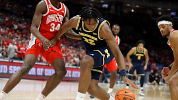 Mar 3, 2024; Columbus, Ohio, USA; Michigan Wolverines forward Tarris Reed Jr. (32) loses the ball as