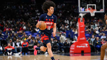 Feb 10, 2025; Washington, District of Columbia, USA; Washington Wizards forward Kyshawn George (18) handles the ball during the third quarter against the San Antonio Spurs at Capital One Arena. Mandatory Credit: Reggie Hildred-Imagn Images
