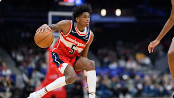 Feb 7, 2025; Washington, District of Columbia, USA; Washington Wizards guard AJ Johnson (5) handles the ball during the second quarter against the Cleveland Cavaliers at Capital One Arena. Mandatory Credit: Reggie Hildred-Imagn Images