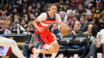 Mar 21, 2025; Washington, District of Columbia, USA; Washington Wizards forward Kyshawn George (18) drives to the basket during the third quarter at Capital One Arena. Mandatory Credit: Reggie Hildred-Imagn Images