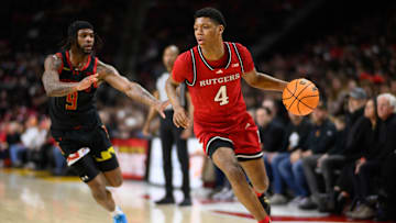 Feb 9, 2025; College Park, Maryland, USA; Rutgers Scarlet Knights guard Ace Bailey (4) drives to the basket against Maryland Terrapins guard Selton Miguel (9) during the first half at Xfinity Center. Mandatory Credit: Reggie Hildred-Imagn Images