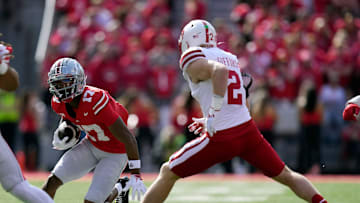Ohio State Buckeyes wide receiver Carnell Tate (17) heads up field against Nebraska Cornhuskers defensive back Isaac Gifford (2) after a catch during the first quarter of their game at Ohio Stadium on Oct 26, 2024, in Columbus.
