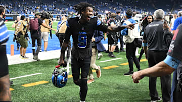 Sep 30, 2024; Detroit, Michigan, USA;  Detroit Lions wide receiver Jameson Williams (9) celebrates as he runs off the field after defeating the Seattle Seahawks at Ford Field. Mandatory Credit: Lon Horwedel-Imagn Images