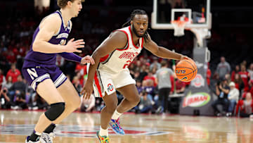 Feb 20, 2025; Columbus, Ohio, USA;  Ohio State Buckeyes guard Bruce Thornton (2) collides with Northwestern Wildcats forward Nick Martinelli (2) during the second half  at Value City Arena. Mandatory Credit: Joseph Maiorana-Imagn Images
