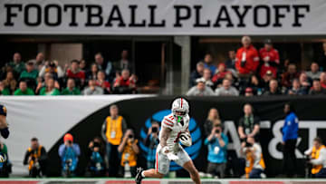 Ohio State Buckeyes wide receiver Brandon Inniss (11) heads up field after a catch against Notre Dame Fighting Irish in the second quarter during the College Football Playoff championship at Mercedes-Benz Stadium in Atlanta on January 20, 2025.