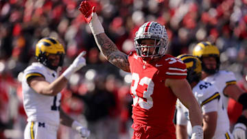 Nov 30, 2024; Columbus, Ohio, USA; Ohio State Buckeyes defensive end Jack Sawyer (33)celebrates a fourth down stop during the first quarter against the Michigan Wolverines at Ohio Stadium. Mandatory Credit: Joseph Maiorana-Imagn Images