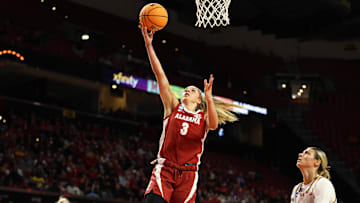 Mar 24, 2025; College Park, Maryland, USA; Alabama Crimson Tide guard Sarah Ashlee Barker (3) takes a shot over Maryland Terrapins guard Saylor Poffenbarger (6) during the first half at Xfinity Center. Mandatory Credit: Daniel Kucin Jr.-Imagn Images