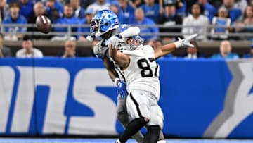 Oct 30, 2023; Detroit, Michigan, USA; Detroit Lions safety Kerby Joseph (31) breaks up a pass intended for Las Vegas Raiders tight end Michael Mayer (87) in the third quarter at Ford Field. Mandatory Credit: Lon Horwedel-Imagn Images