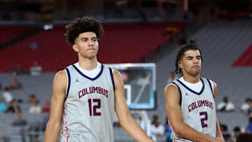 Jun 24, 2023; Glendale, AZ, USA; Columbus player Cameron Boozer (12) and brother Cayden Boozer (2) during the Section 7 high school boys tournament at State Farm Stadium. Mandatory Credit: Mark J. Rebilas-Imagn Images