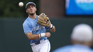 Jun 3, 2024; Chapel Hill, NC, USA;  North Carolina Tar Heels Alex Madera (1) makes a throw to first base for an out against the Louisiana State Tigers during the Div. I NCAA baseball regional at Boshamer Stadium.  Mandatory Credit: Jeffrey Camarati-Imagn Images
