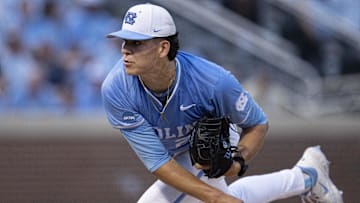 Jun 8, 2024; Chapel Hill, NC, USA; North Carolina Tar Heels Jason DeCaro (29) pitches against the West Virginia Mountaineers in the first inning of the DI Baseball Super Regional at Boshamer Stadium. Mandatory Credit: Jeffrey Camarati-Imagn Images
