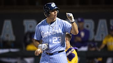 Jun 2, 2024; Chapel Hill, NC, USA; North Carolina Tar Heels designated hitter Alberto Osuna (23) reacts to earning a walk against the Louisiana State Tigers  in the ninth inning of the Div. I NCAA baseball regional at Boshamer Stadium.  Mandatory Credit: Jeffrey Camarati-Imagn Images
