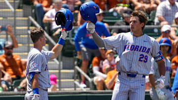 Florida catcher Brody Donay (29) and infielder Bobby Boser (6) celebrate a home run by Donay during the game against the Texas Longhorns at UFCU Disch-Falk Field on Sunday, May 11, 2025 in Austin.