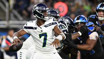 Sep 30, 2024; Detroit, Michigan, USA; Seattle Seahawks quarterback Geno Smith (7) throws a pass against the Detroit Lions in the first quarter at Ford Field. Mandatory Credit: Lon Horwedel-Imagn Images