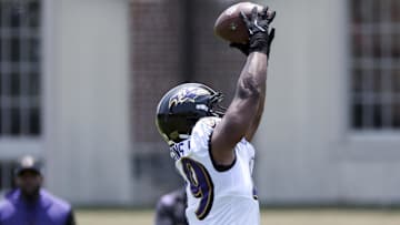 Jun 11, 2025; Baltimore, MD, USA; Baltimore Ravens linebacker Jay Higgins (49) performs a drill during an NFL OTA at Under Armour Performance Center. Mandatory Credit: Daniel Kucin Jr.-Imagn Images