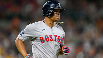 Aug 17, 2024; Baltimore, Maryland, USA; Boston Red Sox third baseman Rafael Devers (11) runs to first base after hitting a home run during the eighth inning against the Baltimore Orioles at Oriole Park at Camden Yards. Mandatory Credit: Reggie Hildred-Imagn Images