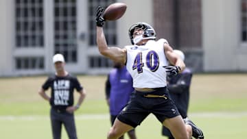 Jun 11, 2025; Baltimore, MD, USA; Baltimore Ravens linebacker Teddye Buchanan (40) makes a catch during an NFL OTA at Under Armour Performance Center. Mandatory Credit: Daniel Kucin Jr.-Imagn Images