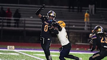 Booker's Chauncey Kennon runs upfield during the Class 3A-Region 3 Final against Boca Ciega in Sarasota on Friday, Nov. 29, 2024. Booker won 41-6.