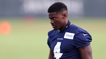 Jun 14, 2022; Houston, Texas, USA;  Houston Texans wide receiver Phillip Dorsett (4) stretches at minicamp at NRG Stadium. Mandatory Credit: Thomas Shea-Imagn Images