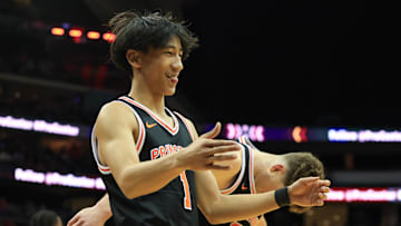 Dec 21, 2024; Newark, New Jersey, USA; St. John's transfer portal target Xaivian Lee (1) react after a timeout call against the Rutgers Scarlet Knights during the first half at Prudential Center. 