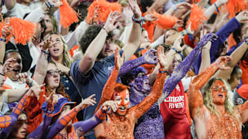 Nov 8, 2025; Clemson, South Carolina, USA; Clemson Tigers fans dance to the music of Miley Cyrus’ “Party in the U.S.A.” during the second quarter of the game against the Florida State Seminoles at Memorial Stadium. Mandatory Credit: Ken Ruinard - GREENVILLE NEWS-USA TODAY Network via Imagn Images