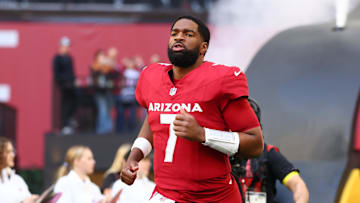 Dec 7, 2025; Glendale, Arizona, USA; Arizona Cardinals quarterback Jacoby Brissett (7) takes the field against the Los Angeles Rams before the game at State Farm Stadium. Mandatory Credit: Mark J. Rebilas-Imagn Images