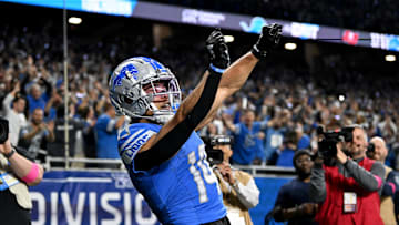 Jan 21, 2024; Detroit, Michigan, USA; Detroit Lions wide receiver Amon-Ra St. Brown (14) celebrates after scoring a touchdown against the Tampa Bay Buccaneers during the second half in a 2024 NFC divisional round game at Ford Field. Mandatory Credit: Lon Horwedel-Imagn Images