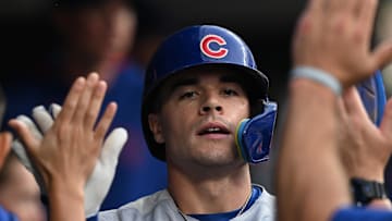 Chicago Cubs third baseman Matt Shaw (6) celebrates in the dugout after scoring a run against the Detroit Tigers.