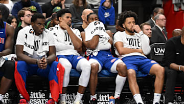 Nov 1, 2024; Detroit, Michigan, USA; Detroit Pistons players, from left, center Jalen Duren, forward Tobias Harris, guard Jaden Ivey and  guard Cade Cunningham react to their 30-point loss to the New York Knicks late in the fourth quarter at Little Caesars Arena. Mandatory Credit: Lon Horwedel-Imagn Images