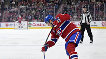 Apr 8, 2025; Montreal, Quebec, CAN; Montreal Canadiens forward Patrik Laine (92) takes a shot on net during the second period of the game against the Detroit Red Wings  at the Bell Centre. Mandatory Credit: Eric Bolte-Imagn Images