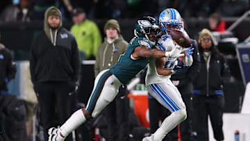 Nov 16, 2025; Philadelphia, Pennsylvania, USA; Philadelphia Eagles cornerback Adoree' Jackson (8) breaks up a pass on Detroit Lions wide receiver Amon-Ra St. Brown (14) during the second half at Lincoln Financial Field. Mandatory Credit: Bill Streicher-Imagn Images