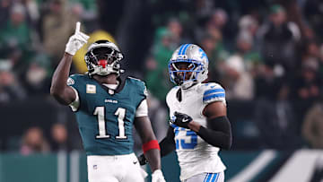 Nov 16, 2025; Philadelphia, Pennsylvania, USA; Philadelphia Eagles wide receiver A.J. Brown (11) reacts after making a catch against Detroit Lions cornerback Rock Ya-Sin (23)  during the first half at Lincoln Financial Field. 
