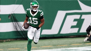 Nov 30, 2025; East Rutherford, New Jersey, USA;New York Jets wide receiver Adonai Mitchell (15) reacts after a touchdown catch against the Atlanta Falcons during the second half at MetLife Stadium. 